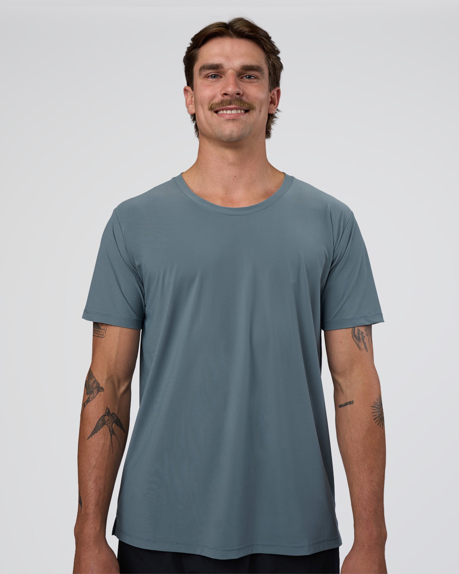 Man wearing Cadence Swift Tee - Blue Mirage | Model:Konnor | Size:M