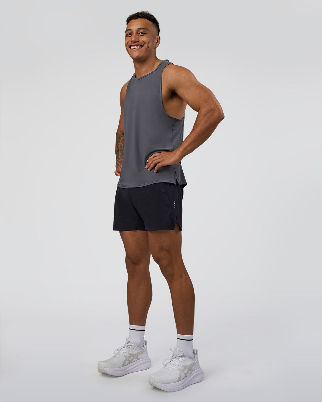 Man wearing Cadence Tank - Dark Storm | Model:Daarian | Size:M - view 1