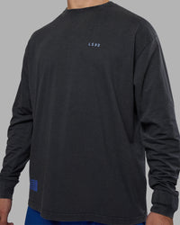 Man wearing Cali FLXCotton Oversized Long Sleeve Tee - Black Washed | Model:Jaiden | Size:M | Thumbnail Index: 12