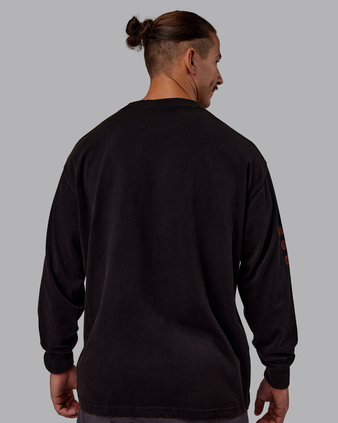 Man wearing Chrome Washed Heavyweight Oversized Long Sleeve Tee - Black-Ultra Orange | Model:Jaiden | Size:M - view 4