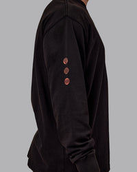 Man wearing Chrome Washed Heavyweight Oversized Long Sleeve Tee - Black-Ultra Orange | Model:Jaiden | Size:M | Thumbnail Index: 5