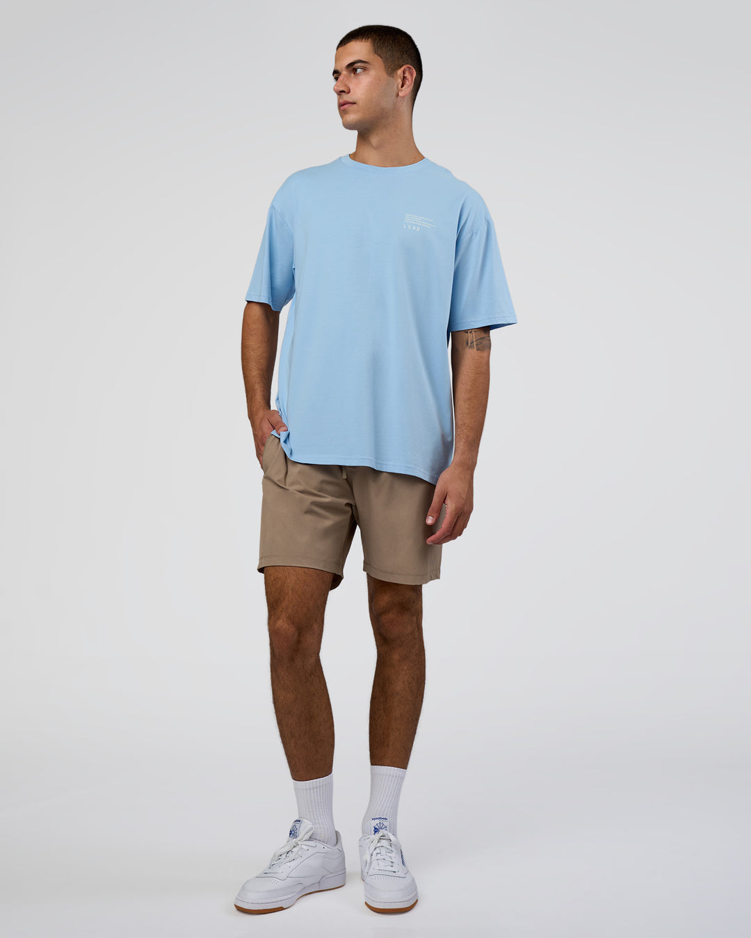 Man wearing Coffee Run FLXCotton Oversized Tee - Open Air-White | Model:Zoran | Size:L - view 5