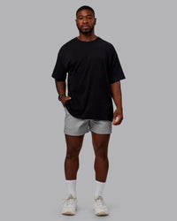 Man wearing Daily 5" Shorts - Circular Grey | Thumbnail Index: 1