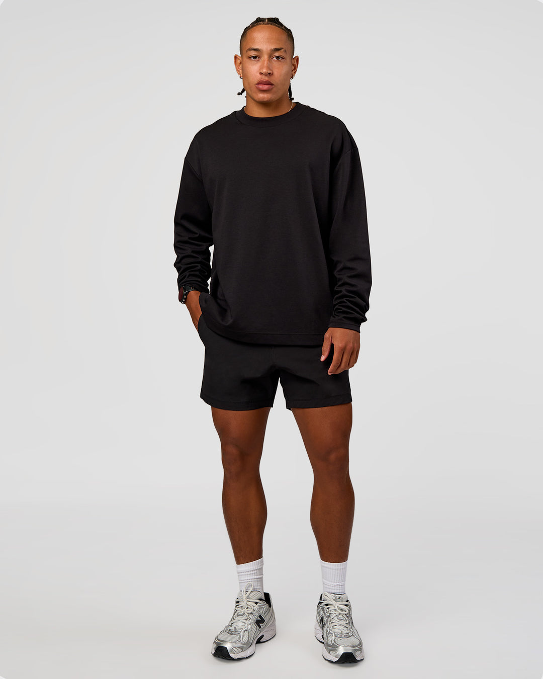Man wearing Daily 5" Short 2.0 in Black | Model:Malebo | Size:M - view 4
