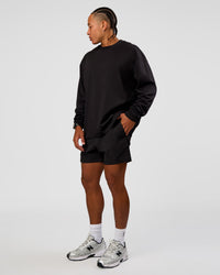 Man wearing Daily 5" Short 2.0 in Black | Model:Malebo | Size:M | Thumbnail Index: 4