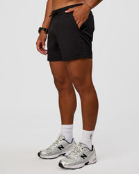 Man wearing Daily 5" Short 2.0 in Black | Model:Malebo | Size:M | Thumbnail Index: 5