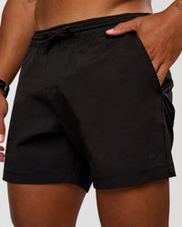 Man wearing Daily 5" Short 2.0 in Black | Model:Malebo | Size:M | Thumbnail Index: 0