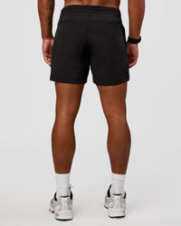 Man wearing Daily 5" Short 2.0 in Black | Model:Malebo | Size:M | Thumbnail Index: 2