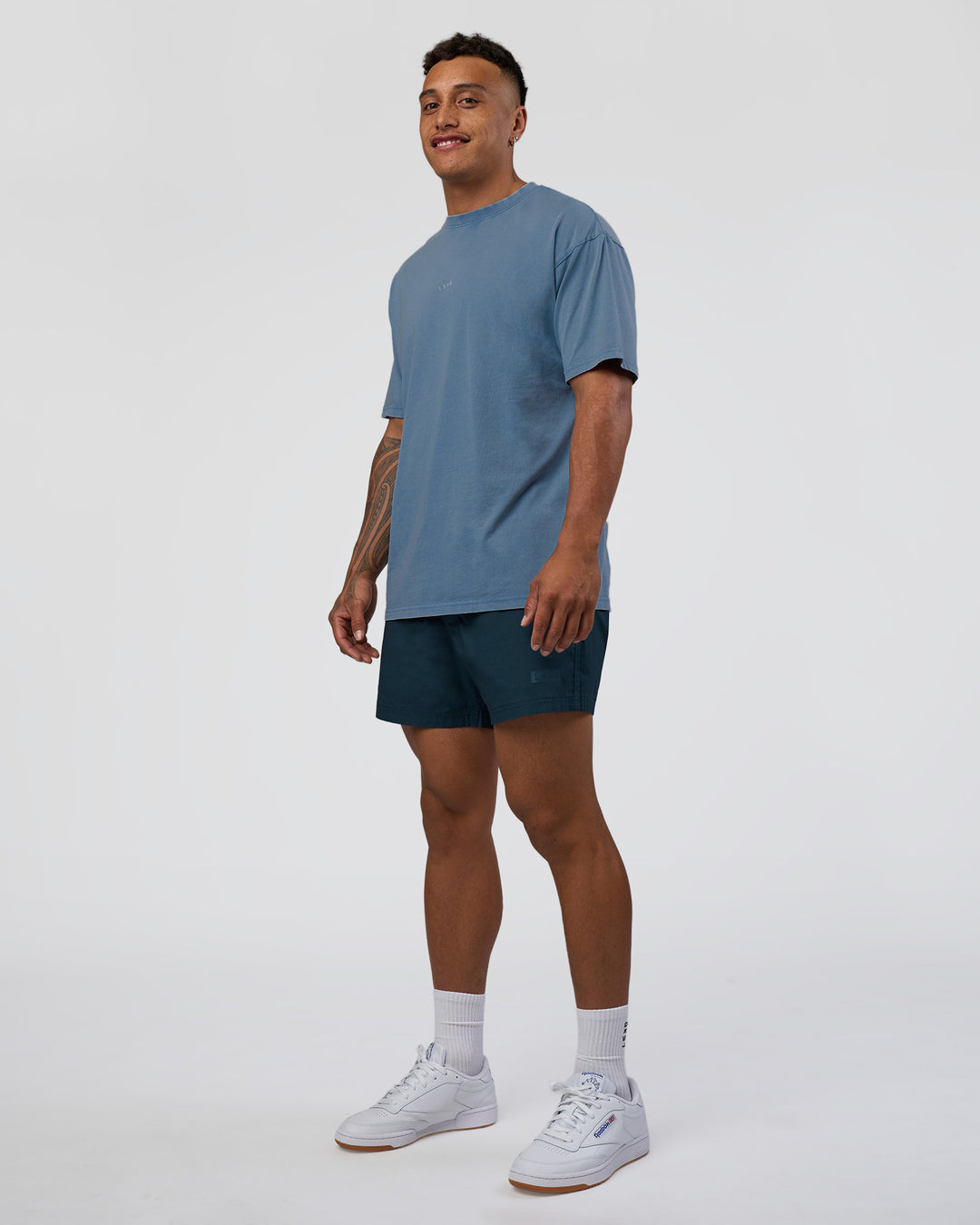 Man wearing Daily 5" Short - Night Sea | Model:Daarian | Size:M - view 3
