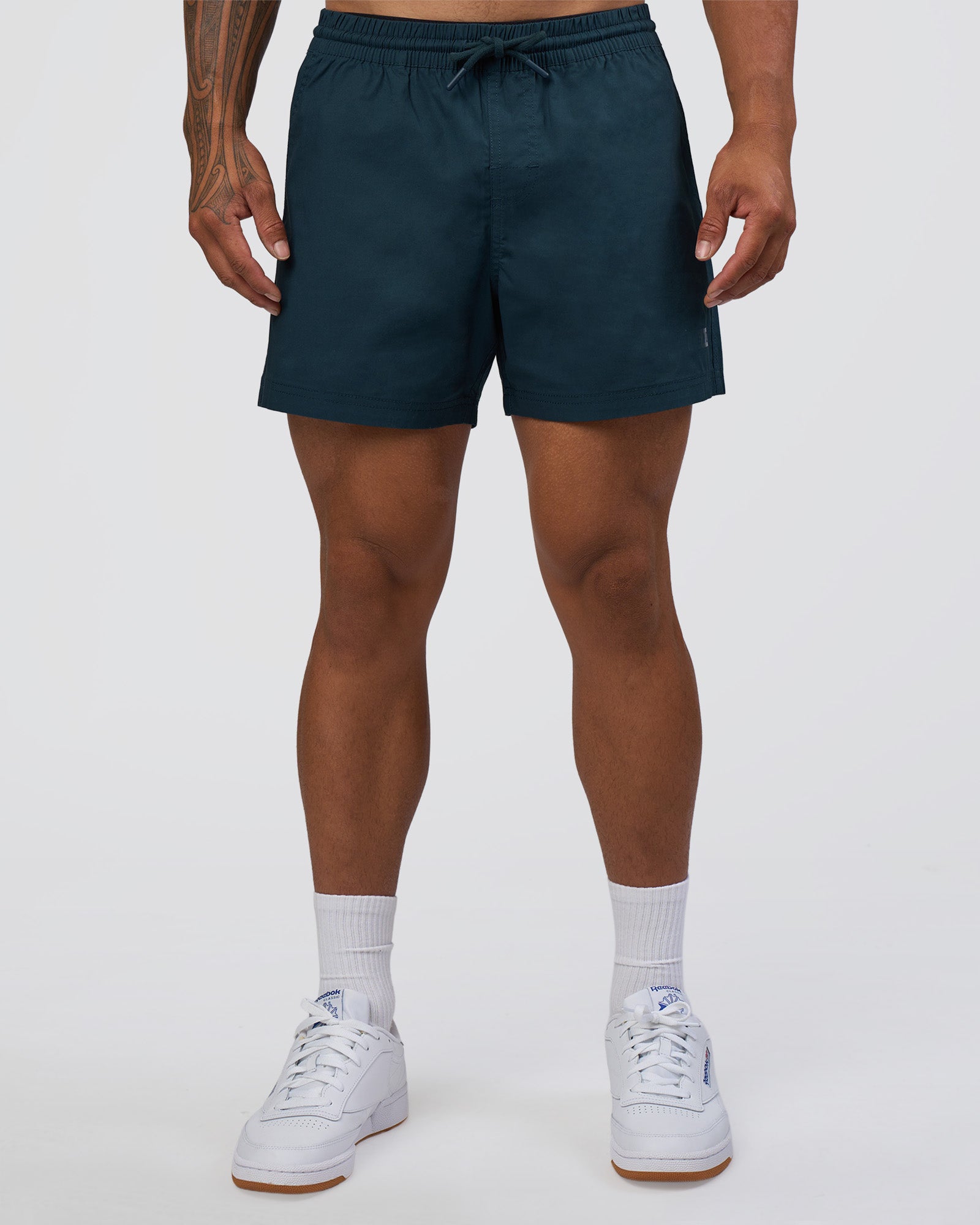 Man wearing Daily 5" Short - Night Sea | Model:Daarian | Size:M