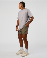 Man wearing Daily 5" Short - Walnut Grey | Model:Malebo | Size:M | Thumbnail Index: 1