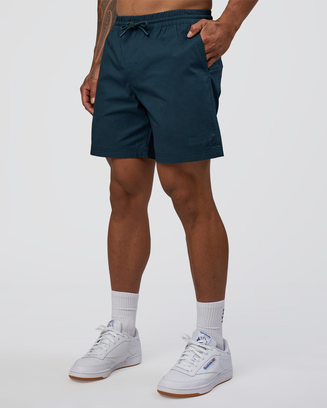 Man wearing Daily 7" Short - Night Sea | Model:Daarian | Size:M - view 1