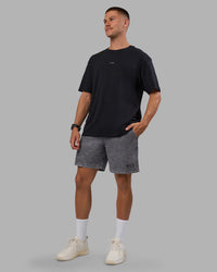 Man wearing Daily Short Pigment 7" - Pigment Dark Storm | Model:Nikola | Size:M | Thumbnail Index: 1