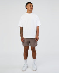 Man wearing Energy Stretch 6" Performance Cargo Short - Iron | Model:Daarian | Size:M | Thumbnail Index: 5