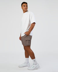 Man wearing Energy Stretch 6" Performance Cargo Short - Iron | Model:Daarian | Size:M | Thumbnail Index: 2