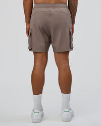 Man wearing Energy Stretch 6" Performance Cargo Short - Iron | Model:Daarian | Size:M | Thumbnail Index: 3