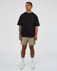 Man wearing Energy Stretch 6" Performance Cargo Short - Laurel Oak | Model:Daarian | Size:M | Thumbnail Index: 1
