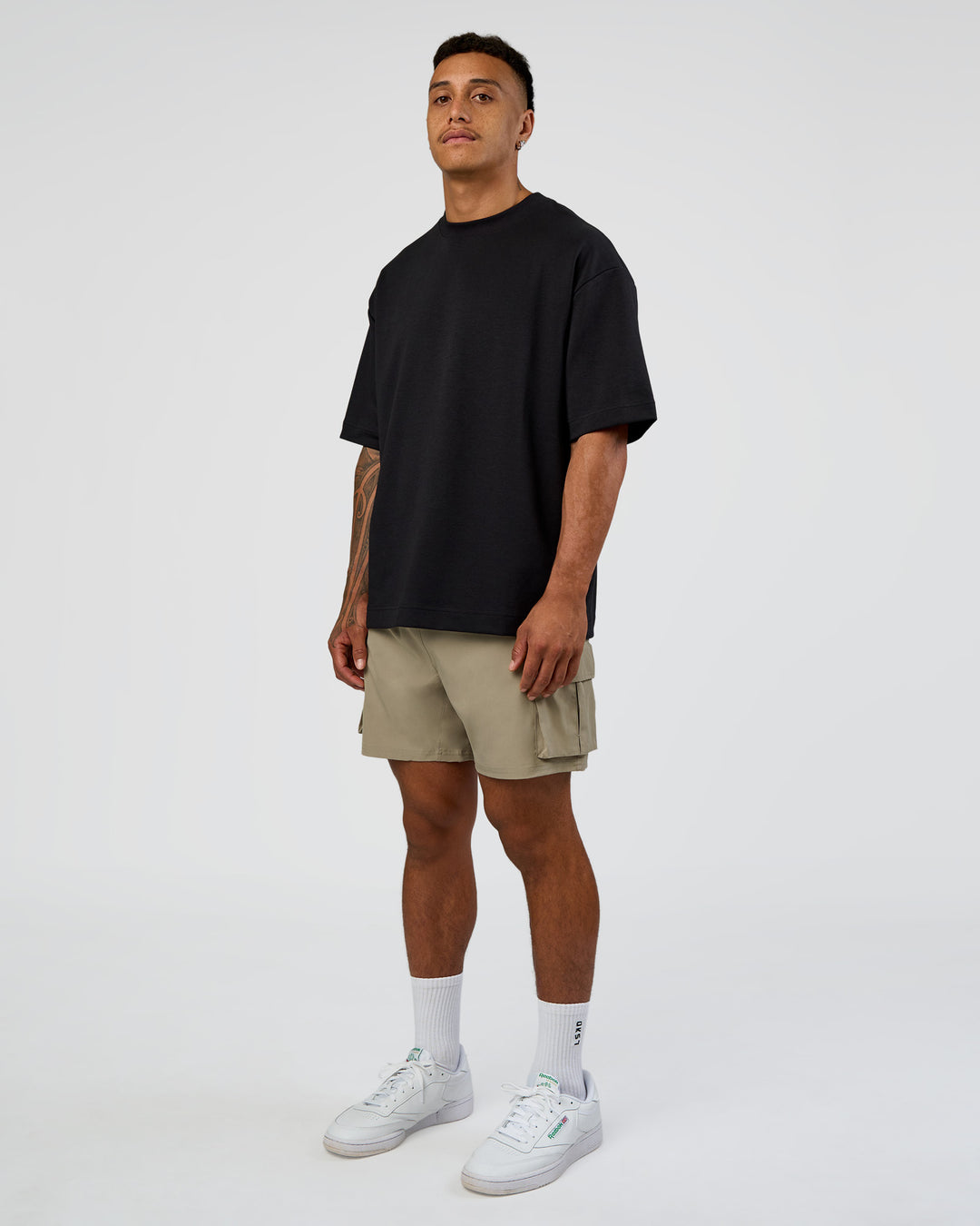 Man wearing Energy Stretch 6" Performance Cargo Short - Laurel Oak | Model:Daarian | Size:M - view 5