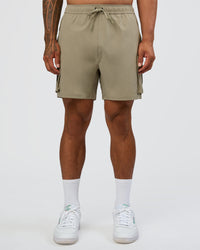 Man wearing Energy Stretch 6" Performance Cargo Short - Laurel Oak | Model:Daarian | Size:M | Thumbnail Index: 7
