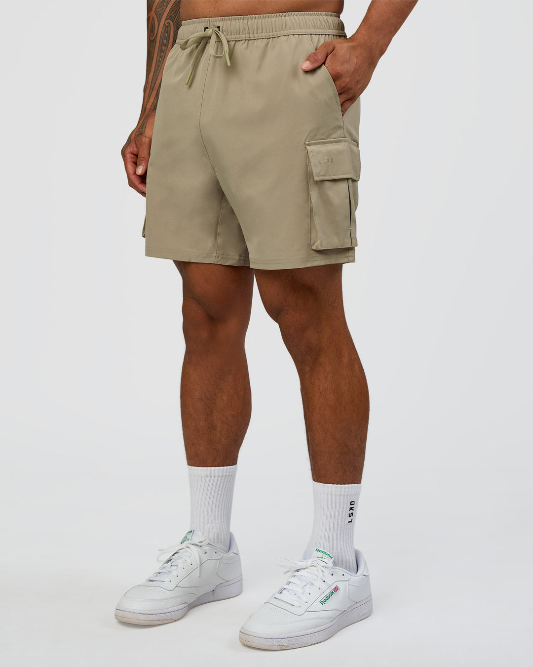 Man wearing Energy Stretch 6" Performance Cargo Short - Laurel Oak | Model:Daarian | Size:M - view 1