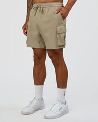 Man wearing Energy Stretch 6" Performance Cargo Short - Laurel Oak | Model:Daarian | Size:M | Thumbnail Index: 0