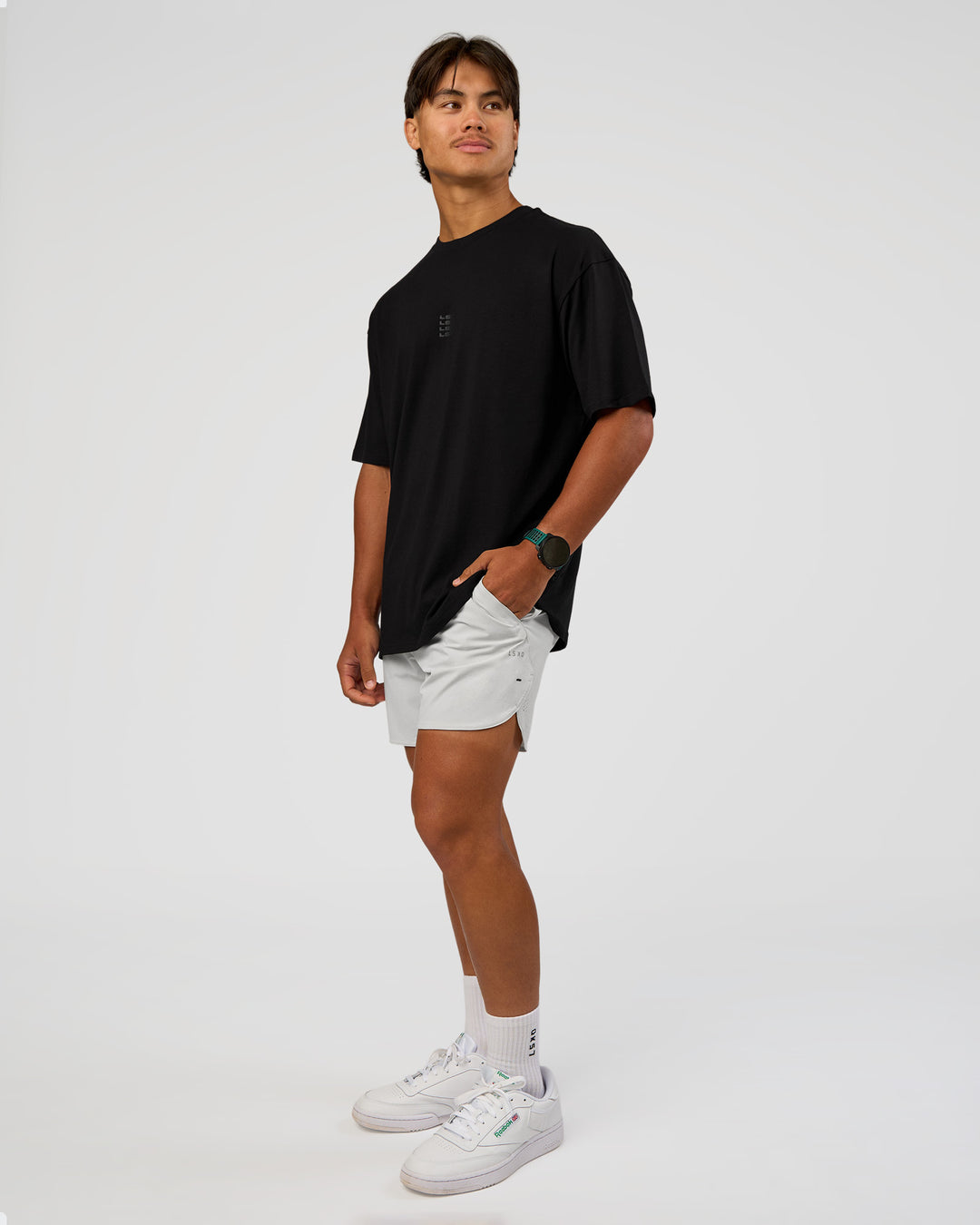 Man wearing Everyday Elevation FLXCotton Oversized Tee - Black-Black | Model:George | Size:M - view 3