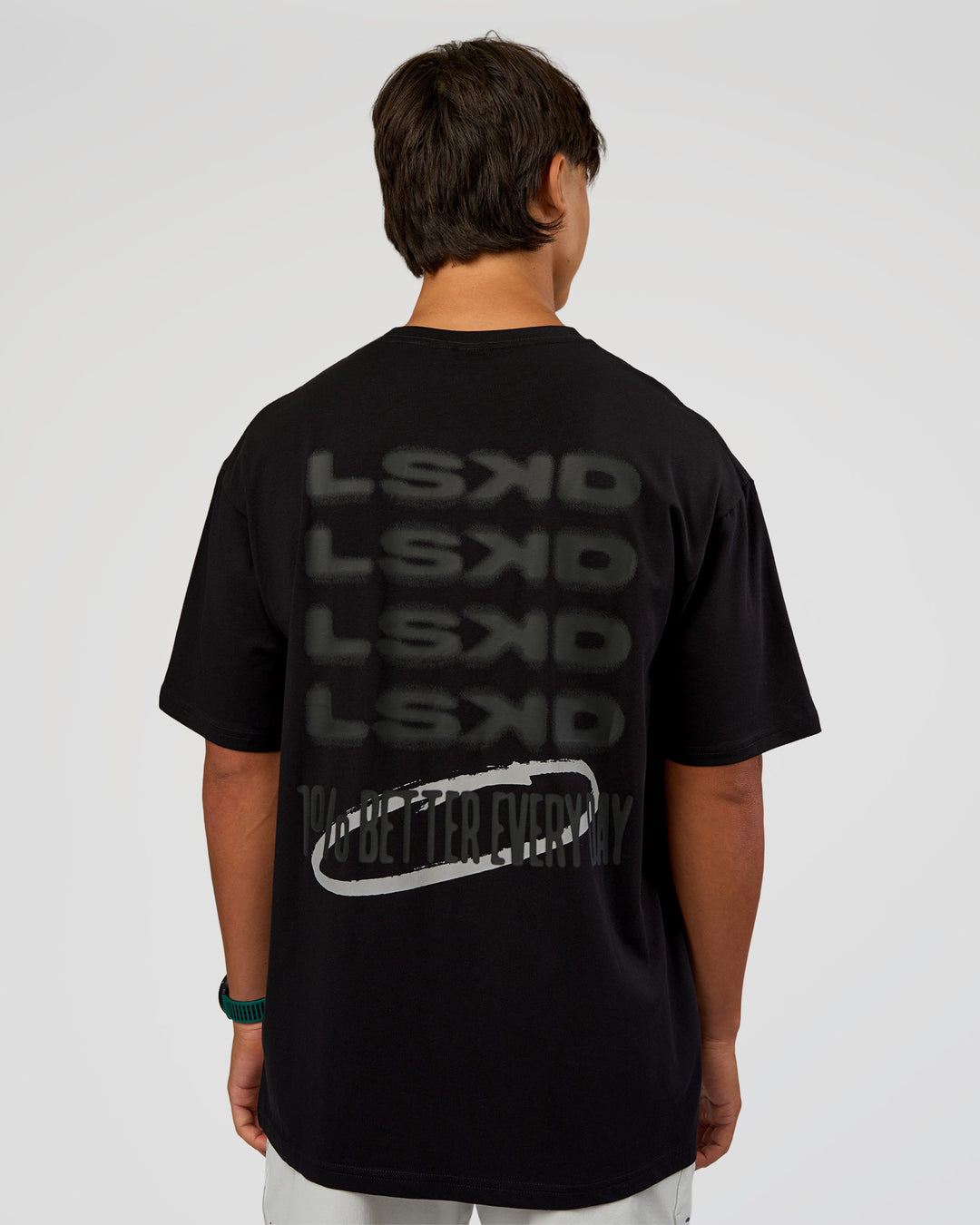 Man wearing Everyday Elevation FLXCotton Oversized Tee - Black-Black | Model:George | Size:M - view 2