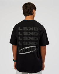 Man wearing Everyday Elevation FLXCotton Oversized Tee - Black-Black | Model:George | Size:M | Thumbnail Index: 1