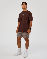 Man wearing Everyday Elevation FLXCotton Oversized Tee - Hot Chocolate-Off White | Model:George | Size:M | Thumbnail Index: 5