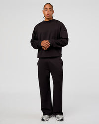 Man wearing Everyday Elevation Waffle Oversized Sweater - Black | Model:Malebo | Size:M | Thumbnail Index: 1