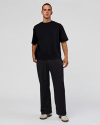 Man wearing Everyday Elevation Waffle Wide Leg Pant - Black | Model:Albert | Size:M | Thumbnail Index: 0