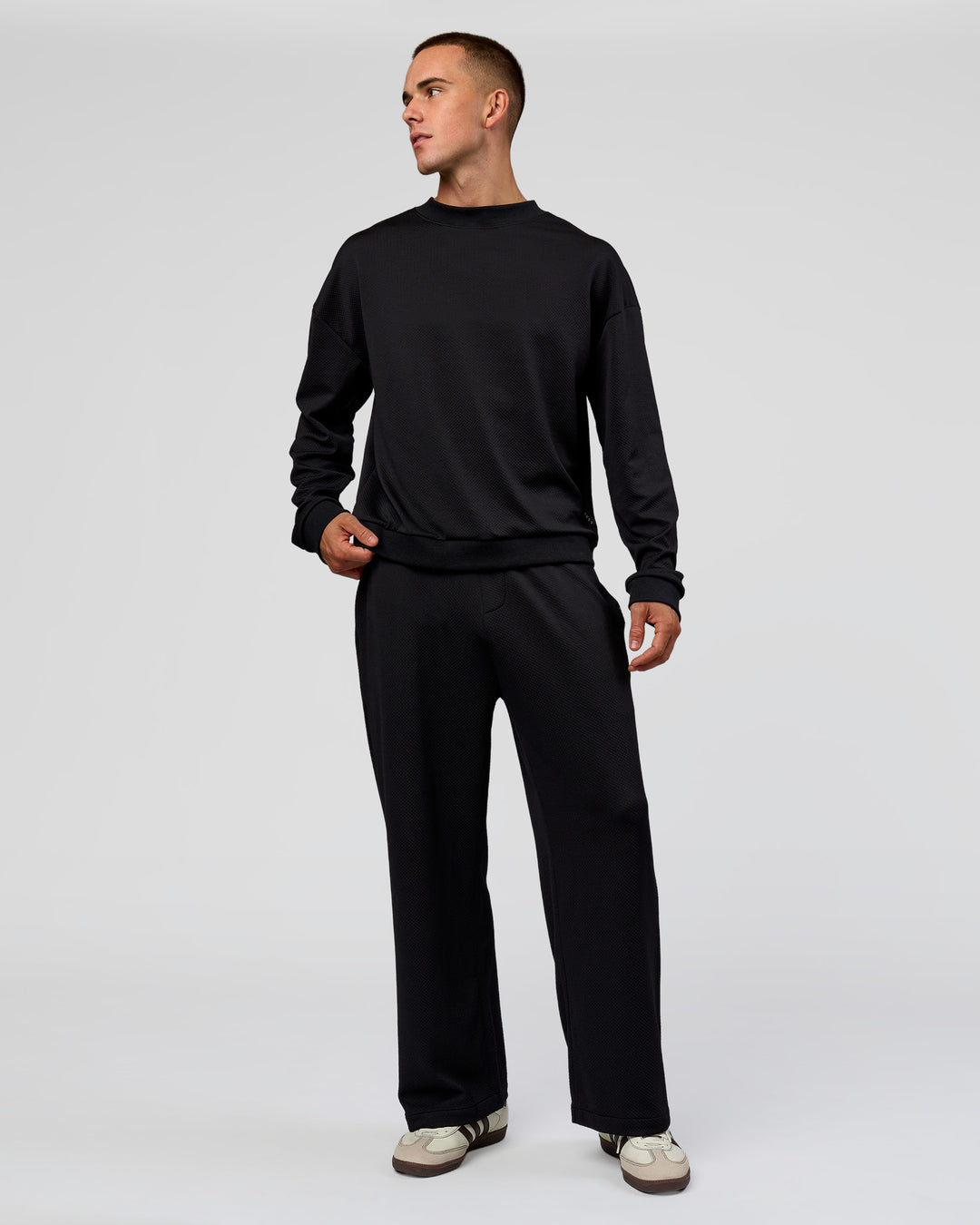 Man wearing Everyday Elevation Waffle Wide Leg Pant - Black | Model:Albert | Size:M - view 10