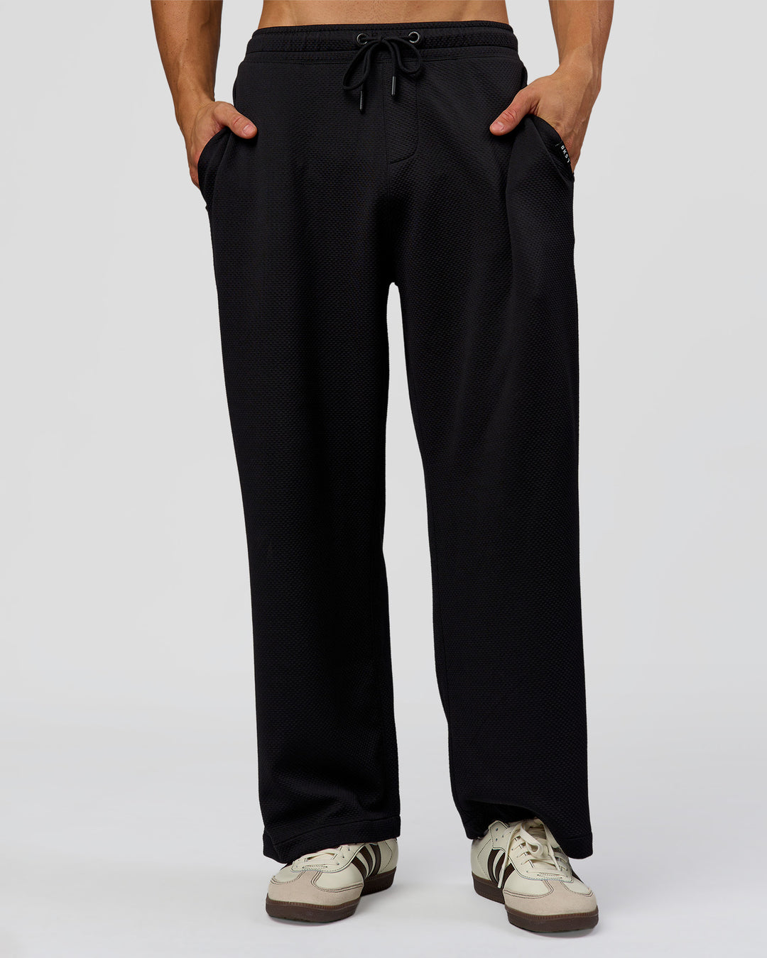 Man wearing Everyday Elevation Waffle Wide Leg Pant - Black | Model:Albert | Size:M - view 4