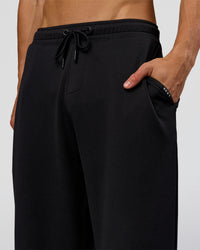 Man wearing Everyday Elevation Waffle Wide Leg Pant - Black | Model:Albert | Size:M | Thumbnail Index: 5