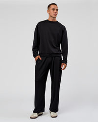 Man wearing Everyday Elevation Waffle Wide Leg Pant - Black | Model:Albert | Size:M | Thumbnail Index: 8