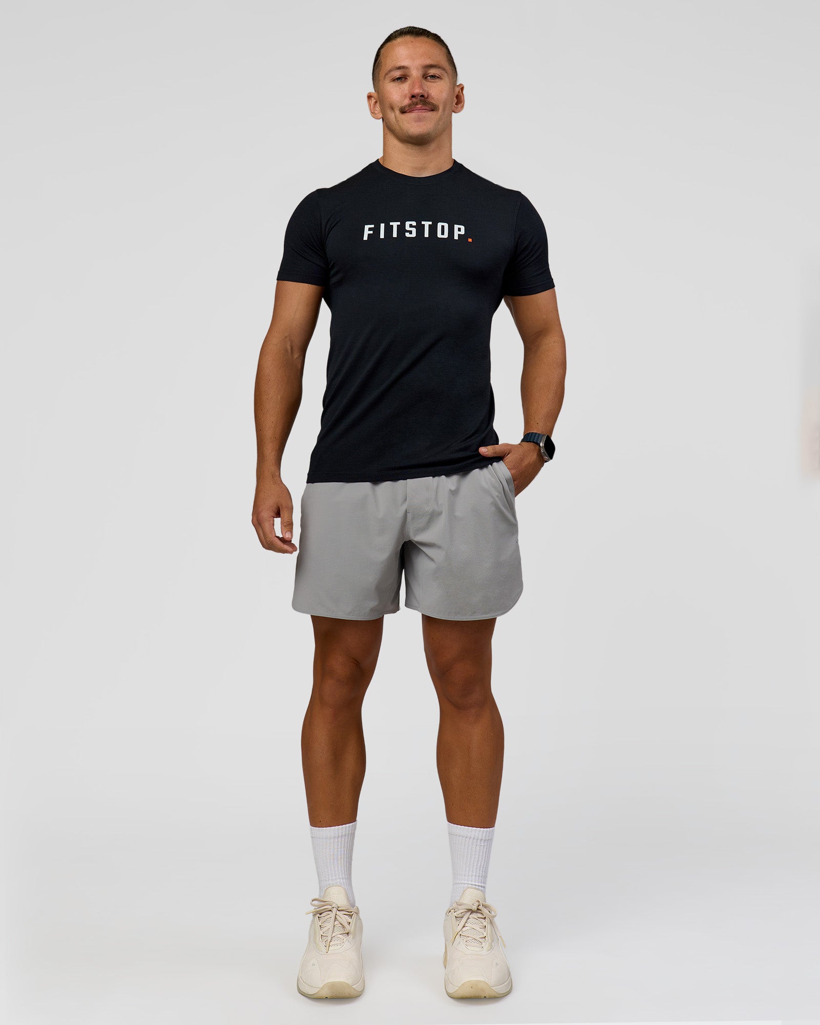 Man wearing Fitstop AeroFLX+ Seamless Tee - Black | Model:Jaiden | Size:M
