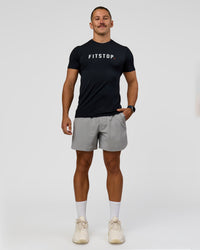 Man wearing Fitstop AeroFLX+ Seamless Tee - Black | Model:Jaiden | Size:M | Thumbnail Index: 1