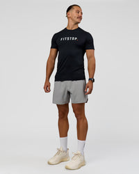 Man wearing Fitstop AeroFLX+ Seamless Tee - Black | Model:Jaiden | Size:M | Thumbnail Index: 4