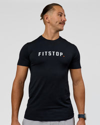 Man wearing Fitstop AeroFLX+ Seamless Tee - Black | Model:Jaiden | Size:M | Thumbnail Index: 0
