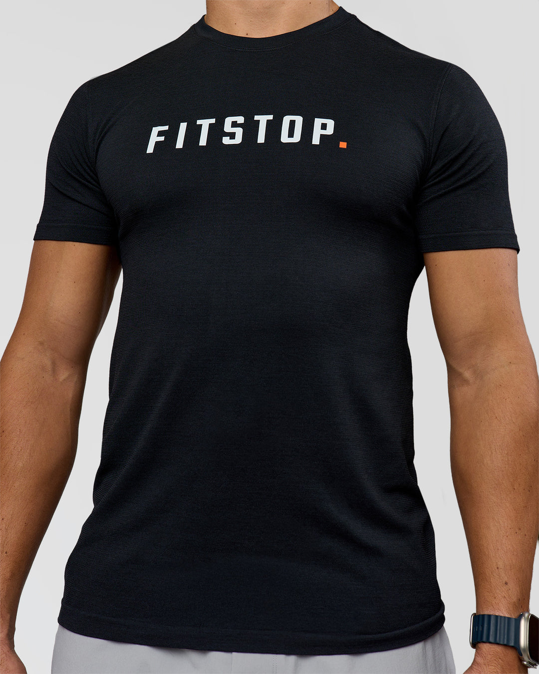 Man wearing Fitstop AeroFLX+ Seamless Tee - Black | Model:Jaiden | Size:M - view 4