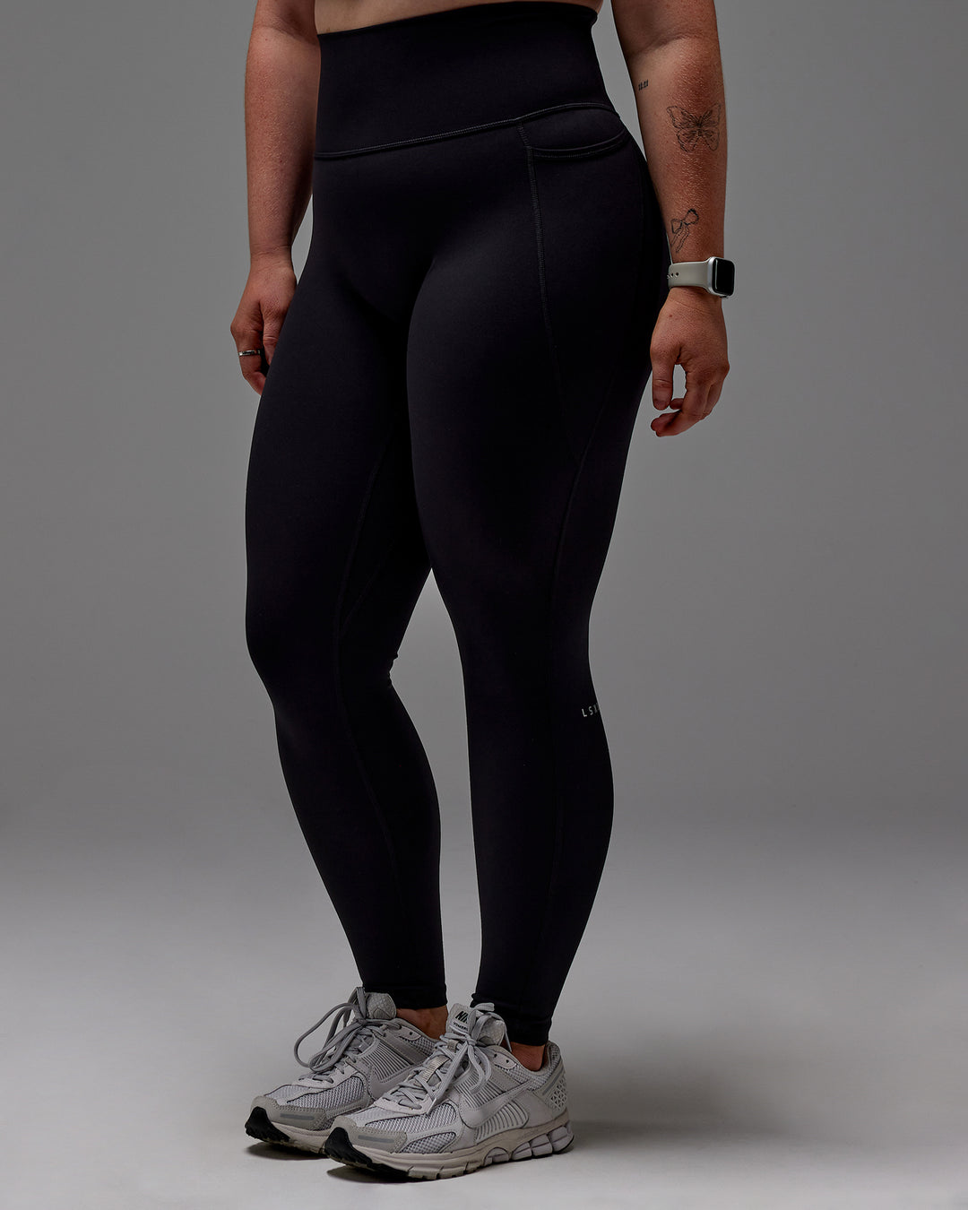 Woman wearing Fusion Ultra High-Rise Full Length Legging Pockets - Black | Model:Caity | Size:M - view 28