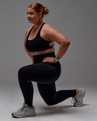 Woman wearing Fusion Ultra High-Rise Full Length Legging Pockets - Black | Model:Caity | Size:M | Thumbnail Index: 26