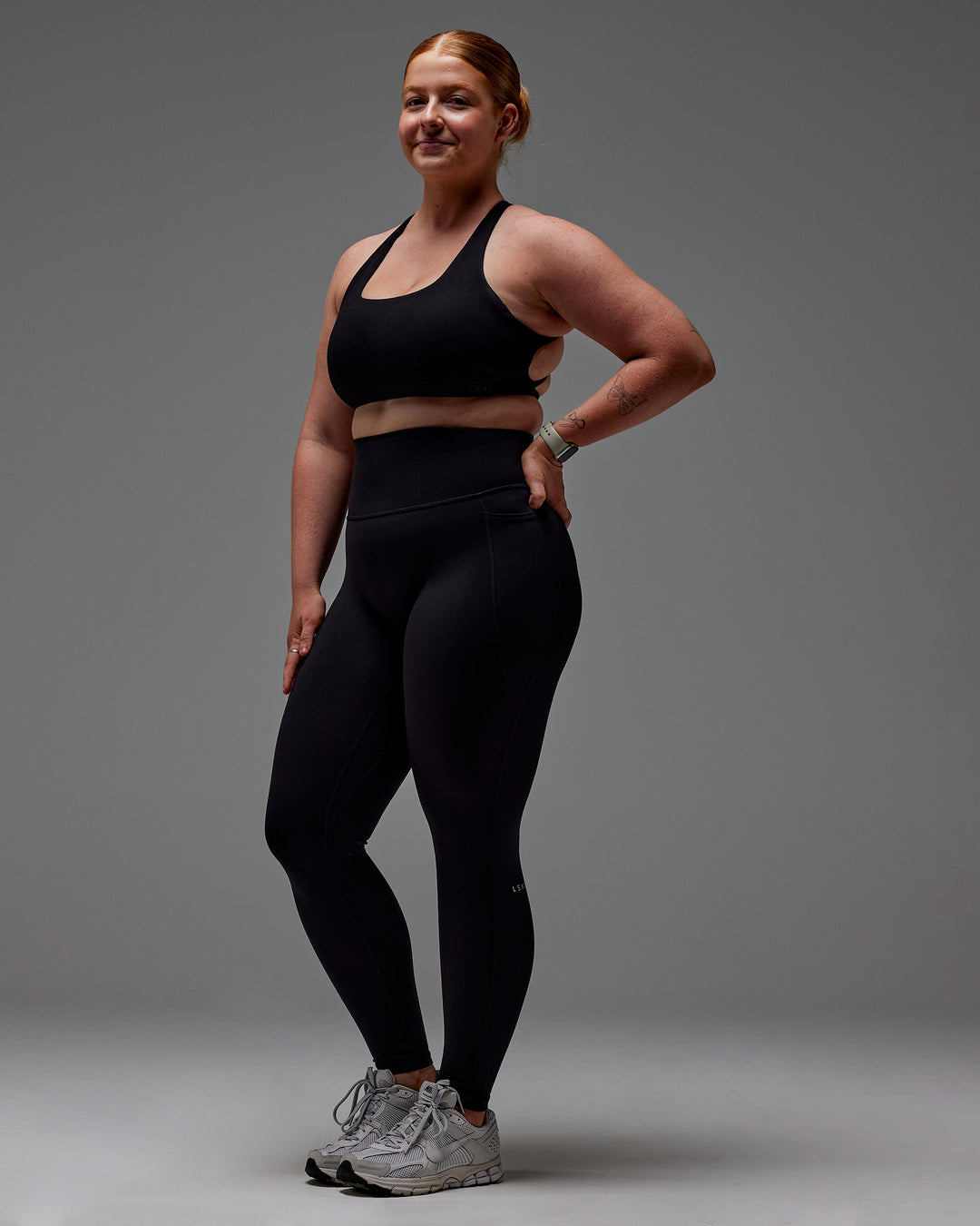 Woman wearing Fusion Ultra High-Rise Full Length Legging Pockets - Black | Model:Caity | Size:M - view 29