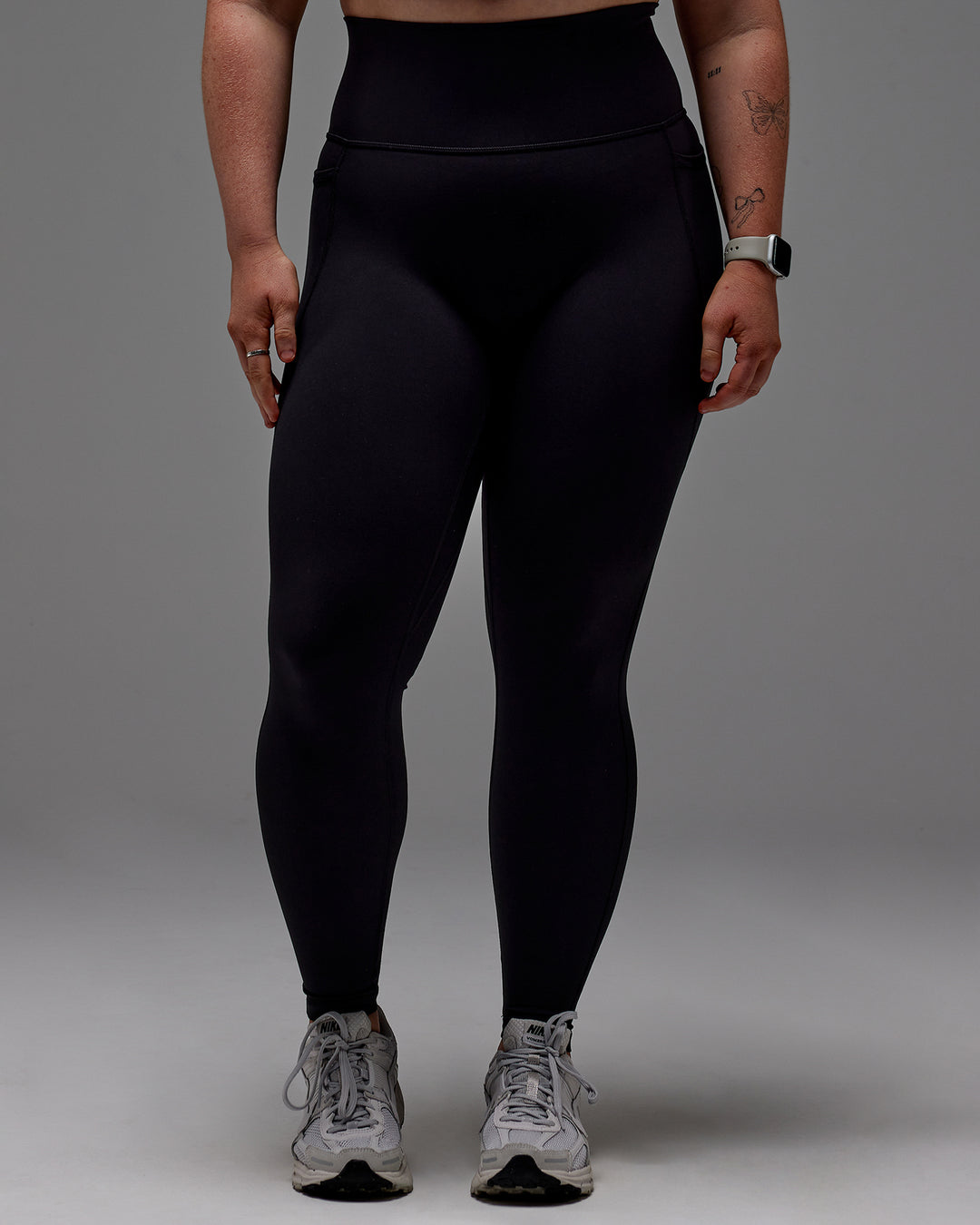 Woman wearing Fusion Ultra High-Rise Full Length Legging Pockets - Black | Model:Caity | Size:M - view 25