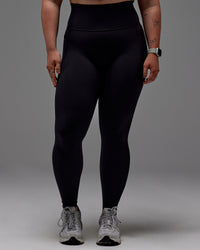 Woman wearing Fusion Ultra High-Rise Full Length Legging Pockets - Black | Model:Caity | Size:M | Thumbnail Index: 24