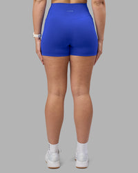Woman wearing Fusion Ultra High-Rise 4" Short Pockets - Power Cobalt | Set:true | Angle:back | Model:Amy | Size:M | Thumbnail Index: 3