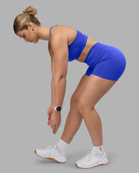 Woman wearing Fusion Ultra High-Rise 4" Short Pockets - Power Cobalt | Model:Amy | Size:M | Thumbnail Index: 8