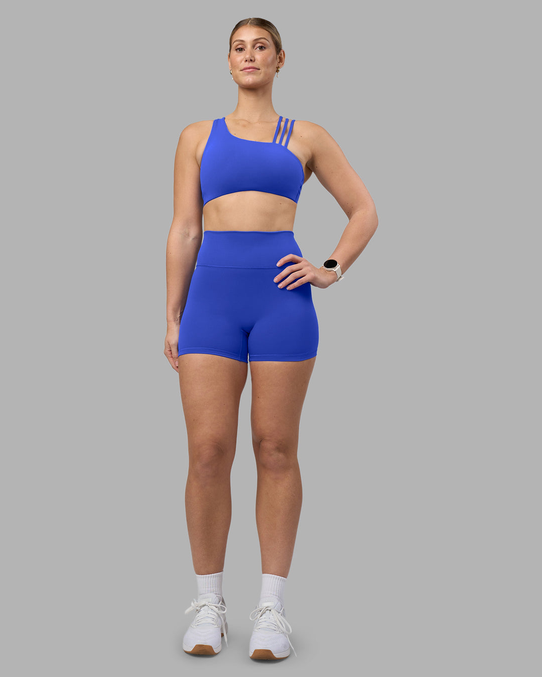 Woman wearing Fusion Ultra High-Rise 4" Short - Power Cobalt | Model:Amy | Size:M - view 6