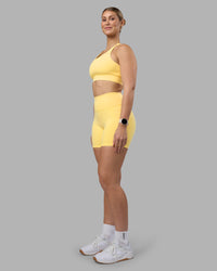 Woman wearing Fusion Ultra High-Rise 6" Short Pockets - Lemon | Model:Amy | Size:M | Thumbnail Index: 4
