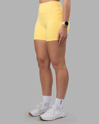 Woman wearing Fusion Ultra High-Rise 6" Short Pockets - Lemon | Model:Amy | Size:M | Thumbnail Index: 6
